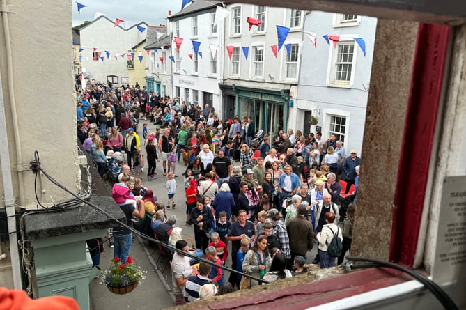 The street was busy for the opening evening events.  AQ 8322
