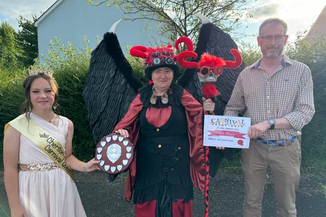 Stella Swain, dressed as a Sourceress, won the Carol Hext award for Best Costume, presented by Charles Sheldrick and Hazel Evely.  AQ 8699
