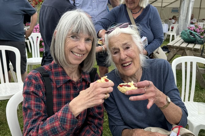 Jackie Patten and Sue Read enjoyed a scone with cream and jam at the Show.  AQ 8585