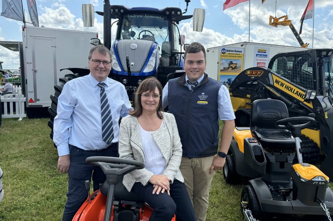 Andrew, Lisa and Scott Symons of Andrew Symons Ltd of Crediton and South Molton welcomed visitors to their stand at the Show.  AQ 8466