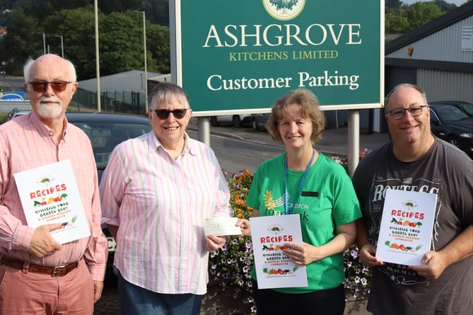 Cheriton Fitzpaine Garden Club members hand over cheque to Crediton Foodbank