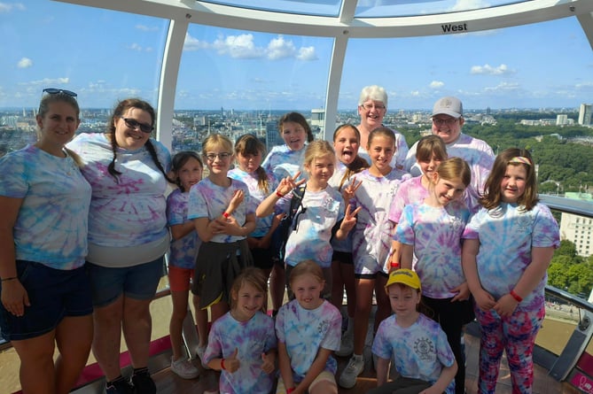 The 4th Crediton Brownies and leaders during their journey on the London Eye.
