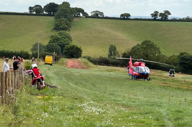 An ambulance and a Devon Air Ambulance at the motocross event near Crediton.  AQ 9183
