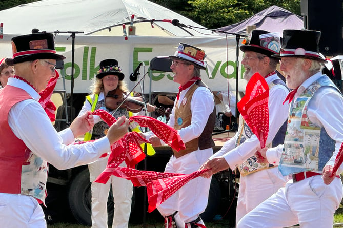 Tinners Morris from South Zeal during a display at the Dartmoor Folk Festival.
