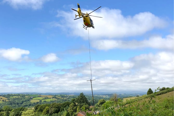 Helicopter lifting pole