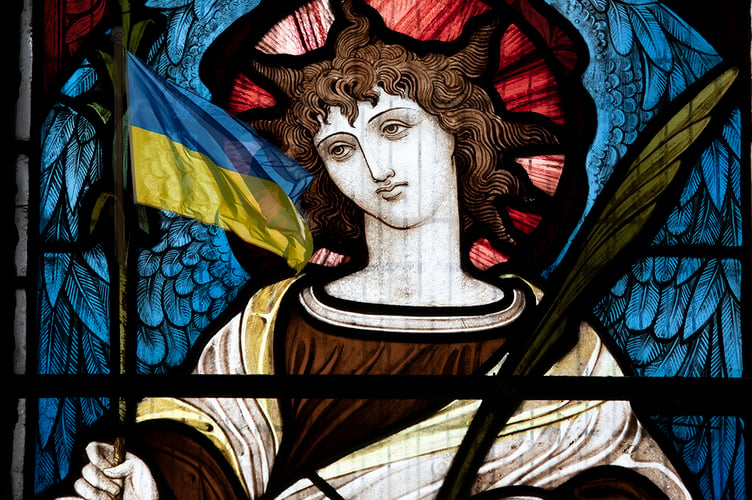 Photograph of one of stained glass windows in St Swithuns Church, Shobrooke taken by club member