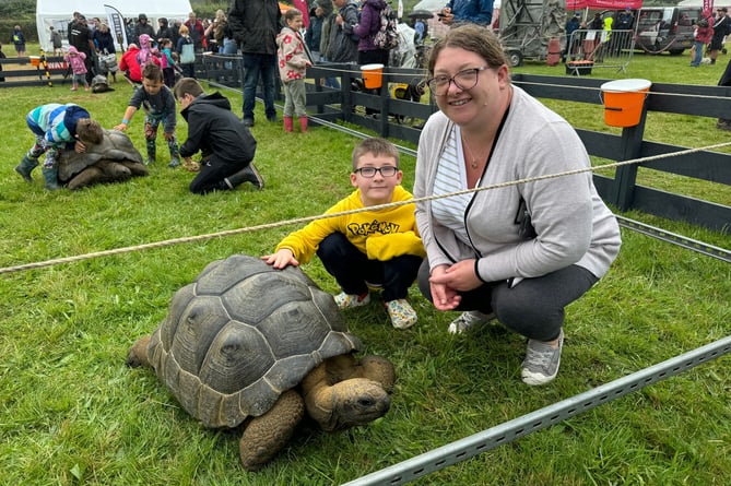 Becky Kimberley and her son Elliot (9) from Okehampton enjoyed meeting the giant tortoises.  AQ 9389
