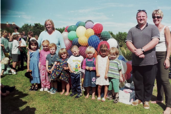 Newton St Cyres Playgroup held a sponsored balloon launch to raise funds for equipment in July 2001. DSC00386