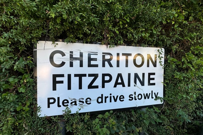 Cheriton Fitzpaine sign.  AQ 8731