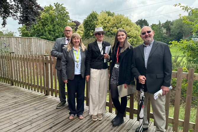 RHS Britain in Bloom judges John Davies, left, and third left, Lesley Jelleyman, with Sue Lee from Crediton Library second left and fourth left, Emma Anderson from Crediton Town Council with right, Bert Jewell.  AQ 7678
