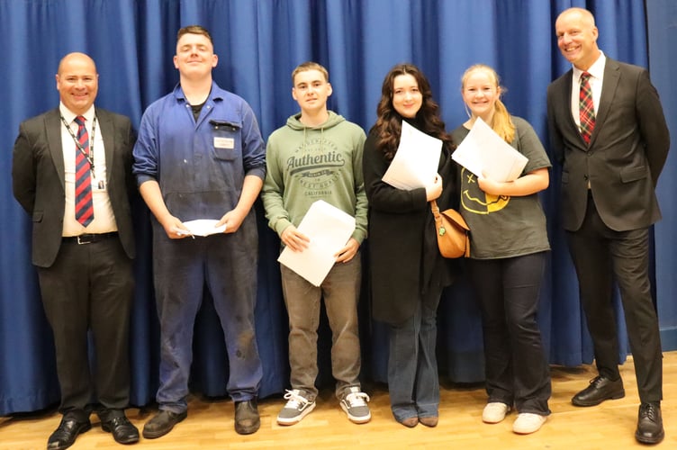 Pleased with GCSE results at Chulmleigh College, from left, Mr Neil Payne (Deputy Executive Headteacher), students Zack Jones, Zak Flanagan, Heidi Flowers and Orla Fosbrook and right, Mr Michael Johnson (Executive Headteacher).
