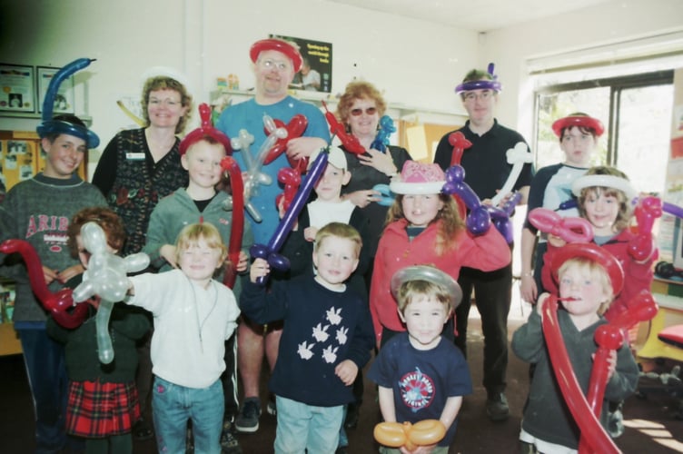 Some of the children who attended a 'Balloon Extravaganza' during the Easter holidays at Crediton Library in April 2002. DSC00342