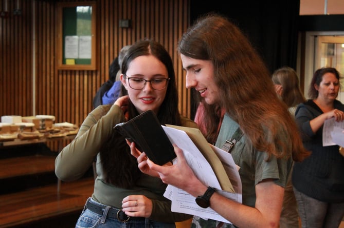 QE students celebrate GCSE success.
