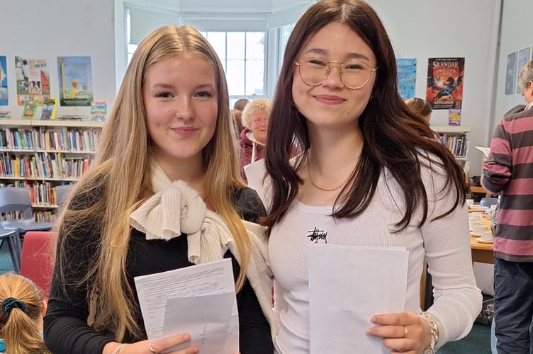 Holly Govier and Terri McNelis collecting their results