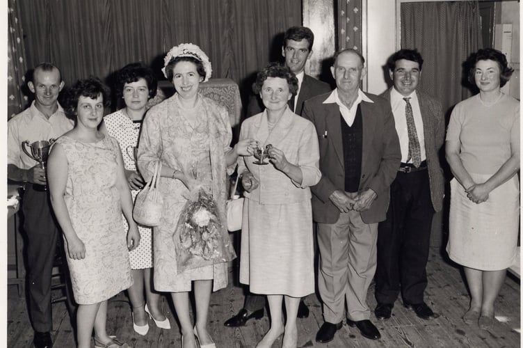 At Zeal Monachorum Village Hall Show in 1967, from left to right: Mr L Quick, Mrs J Burrow, Mrs W Quick, Miss Oatway (Judge), Mrs L Quick, Mr D Webber, Mr A Steer, Mr L Stevens, unknown. Photo no.159 from Zeal Monachorum Archive
