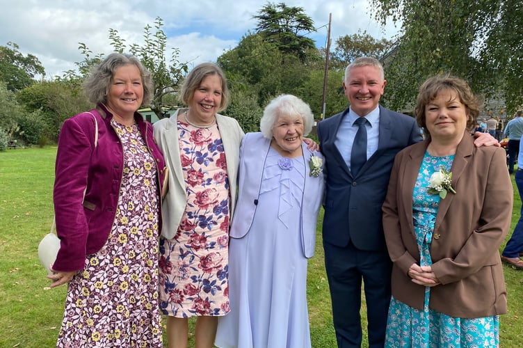 Wyn Saunders, centre, with her children.
