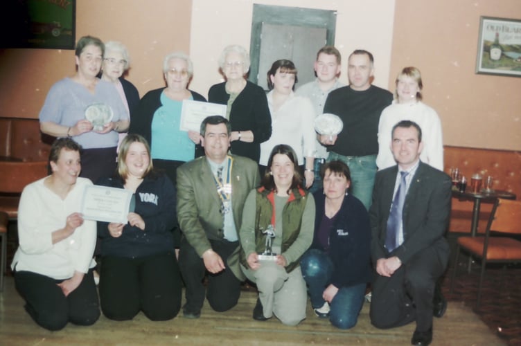 Boniface Rotary Club members and some who took part in a darts competition in March 2003. DSC00915