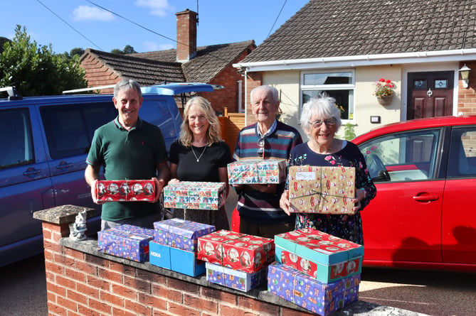 From left, Biffo and Jan Holland, Derek Shapland, Margaret Tucker with shoeboxes