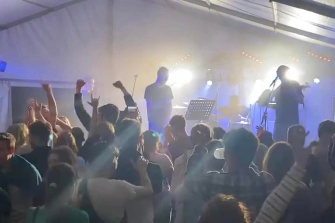 At a previous Thorfest, a great view of a band on stage and a watching crowd.
