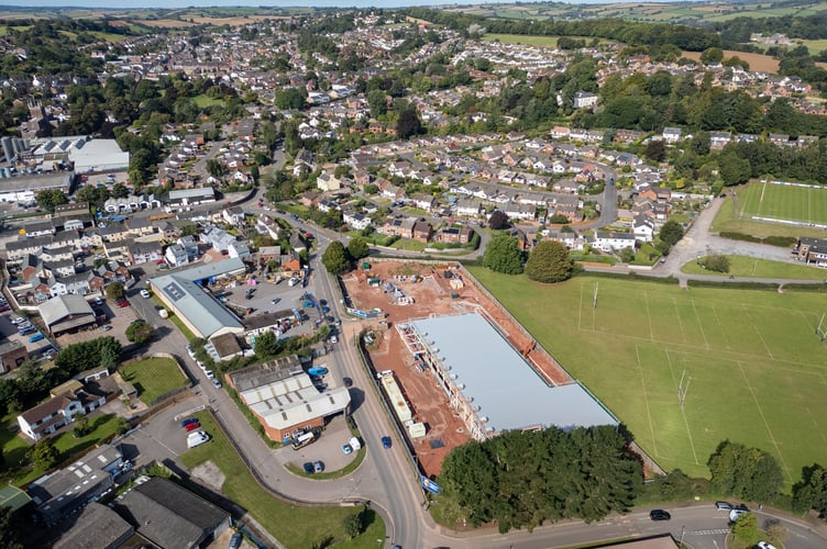 The new Lidl store site in Crediton and a view over the town.
