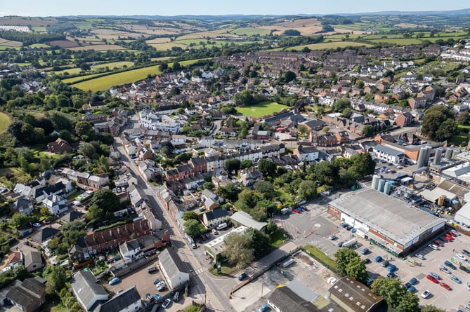 The Crediton Morrisons store and a view over part of the town.
