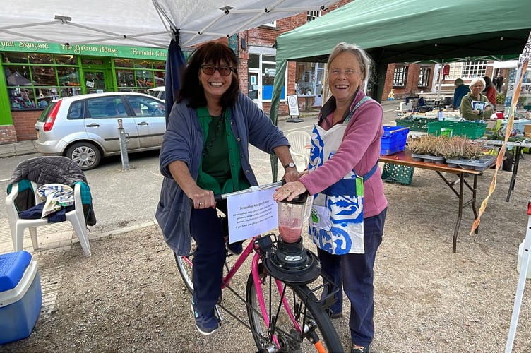 Sue Way and Christina Dymond showing off the smoothie bike