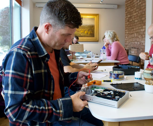 Volunteers fix items at Crediton Repair Cafe