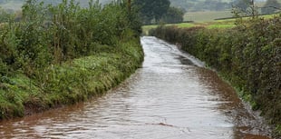 Floods trap cars, shut roads in Crediton area