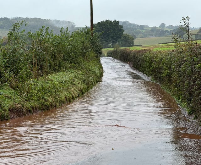 Floods trap cars, shut roads in Crediton area