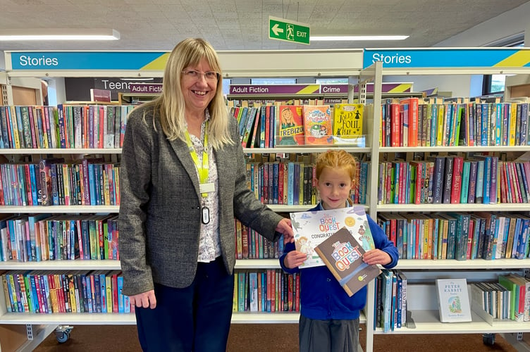 Robyn receiving certificate from Sue Lee at Crediton Library