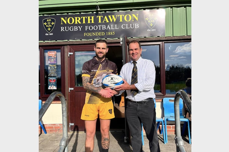 North Tawton RFC match ball sponsor Rob Campbell, right, presenting the match ball to Captain Ryan Gross ahead of the North Tawton v Newton Abbot Seconds game.
