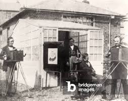 Fox Talbot (right) at the Reading photographic establishment, c.1845 (calotype) 
