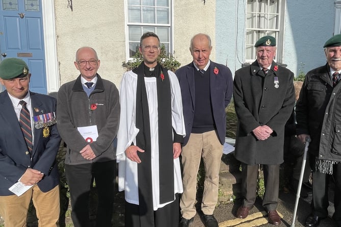 Rev Jeremy Putnam, third from left, led both services