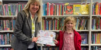 Hannah reads 50 books in library challenge