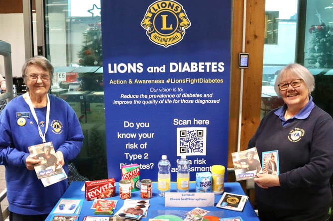 Crediton and District Lions Club Secretary Bronwyn Nott, left, and President Ann Whitehouse with diabetes awareness stand at Crediton Tesco