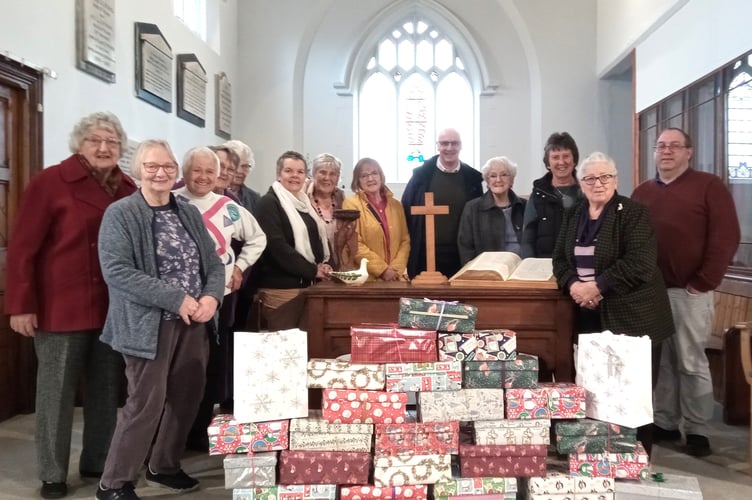 Members of the congregation at Crediton Methodist Church with the shoeboxes for Moldova and Ukraine.
