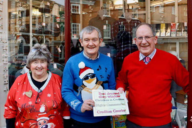 AE Lee Outfitters' window was highly commended. From left, Hazel Evely, Alan Quick, Simon Lee