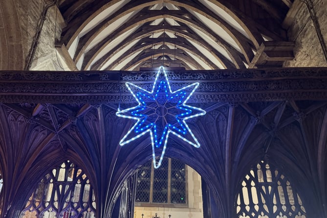 The star shining bright on the rood screen at St Matthew's Church