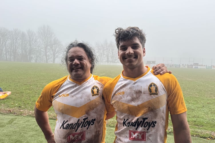 Father and son rugby players at the Boxing Day match