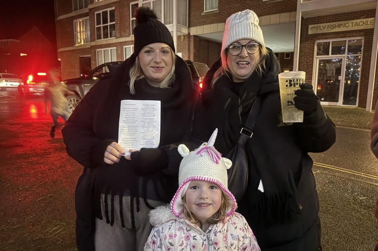 A carol sheet and a pint to take part in the carol singing