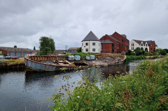 The hulk of the Marie Claire in Exeter Canal