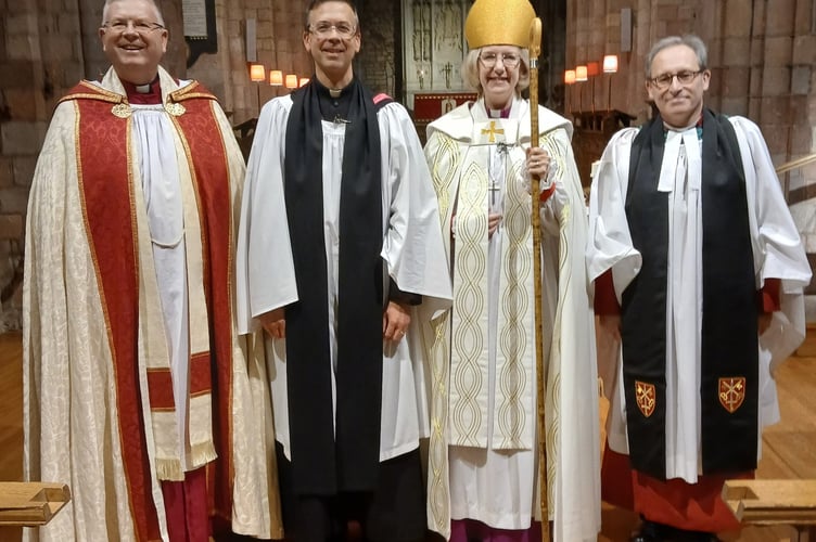 Jeremy Putnam, second from left, at his licensing service