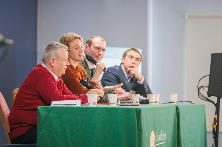 Speakers on the stage at Roostock 2025.
