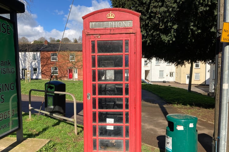 Red telephone kiosk at St Lawrence Green, Crediton