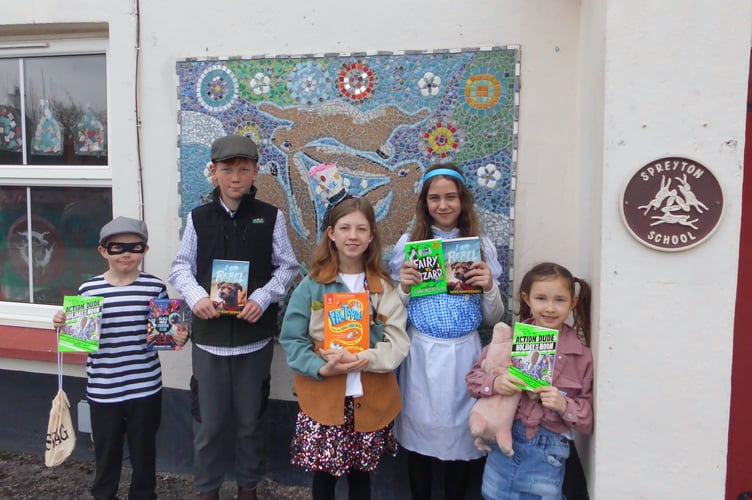 Pupils at Spreyton Primary School with their book choices